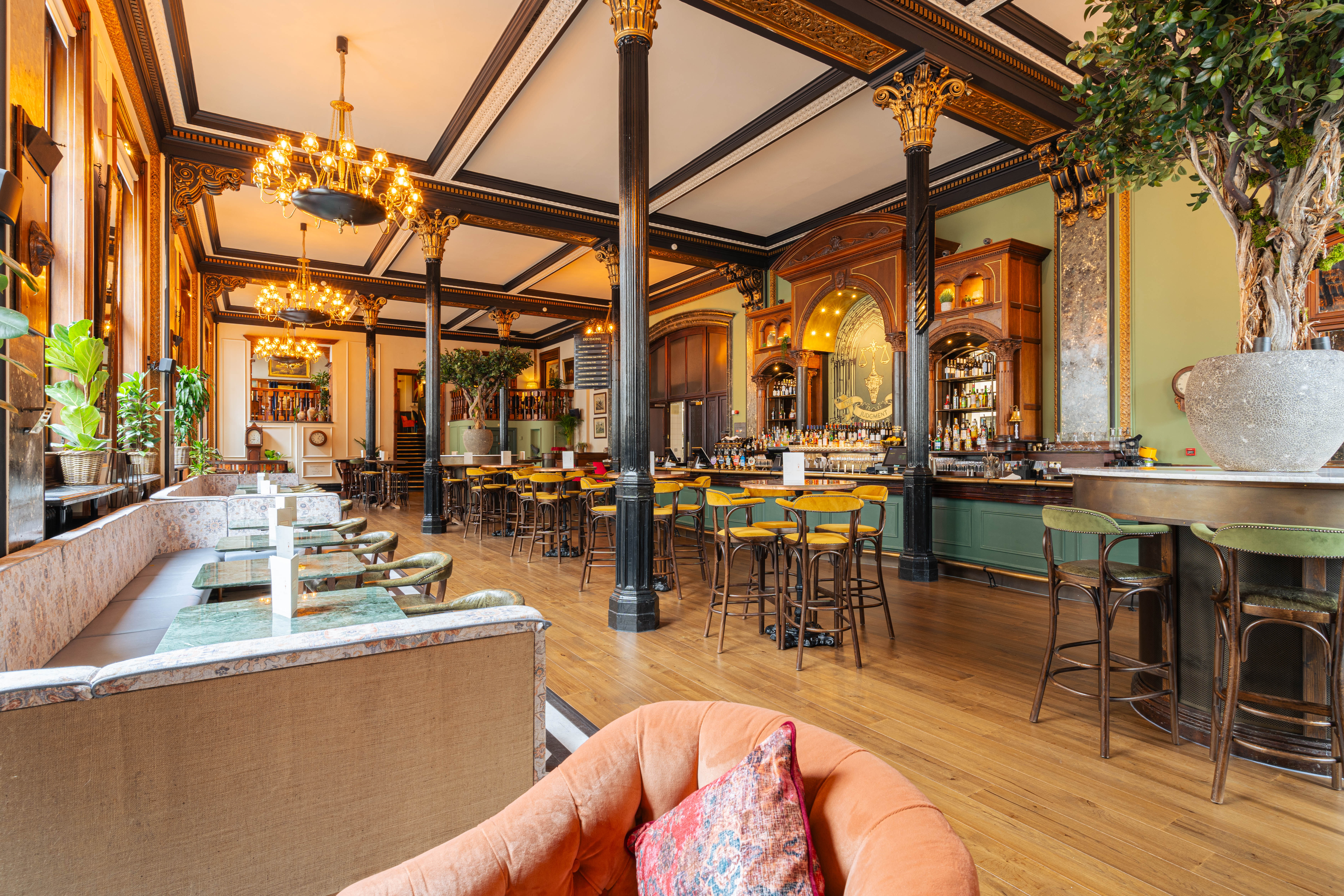 Pub with seating and large tree 