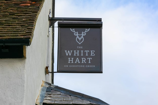 A sign at The White Hart, Godstone