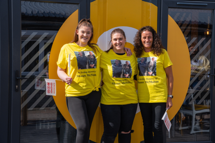 Doncaster team wearing yellow t shirts supporting the charity 