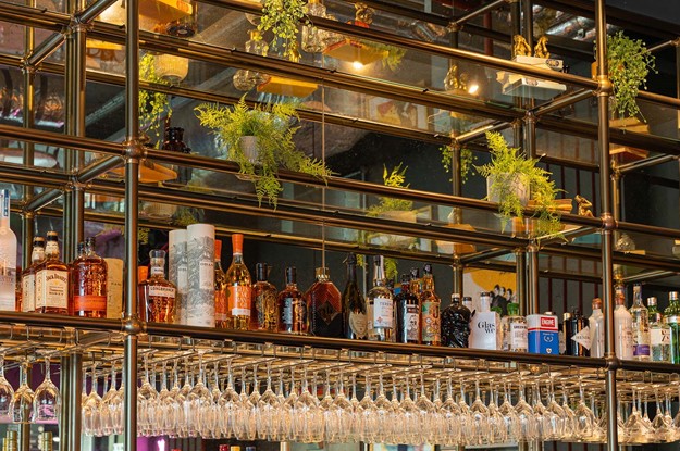 The Green room bar gantries with plants