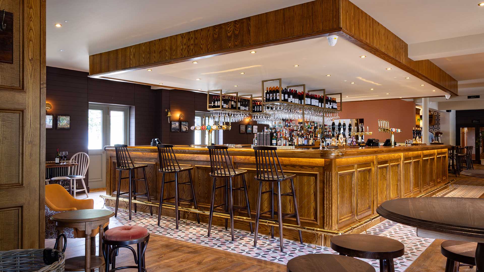 Bedroom with green wall and artwork