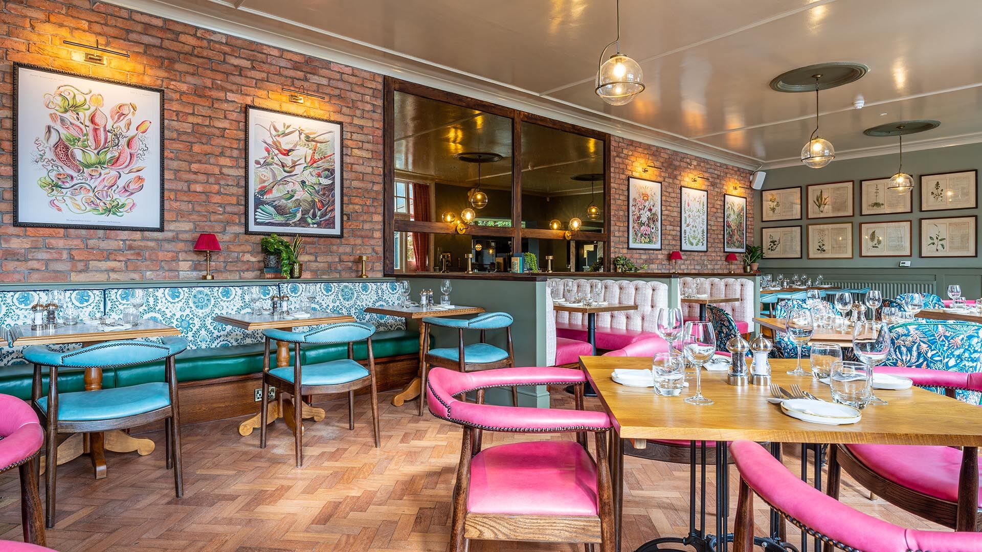 Restaurant dining area with bright seating and artwork
