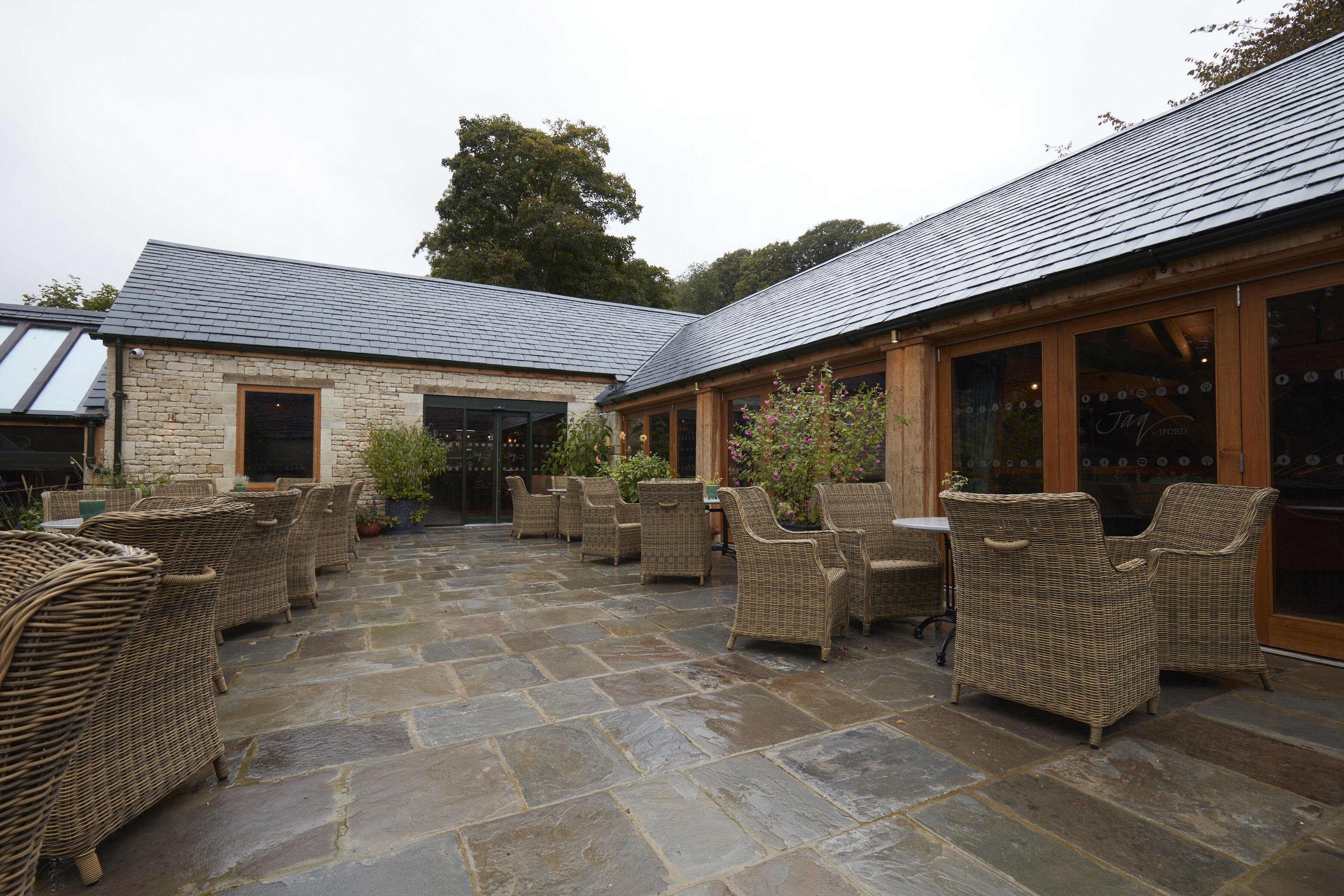 Before and after the interior design fit-out for the cafe at Iford Manor