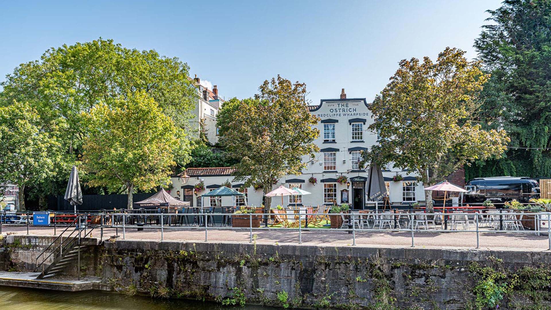Interior dining area after the fit-out with red lampshade and seating