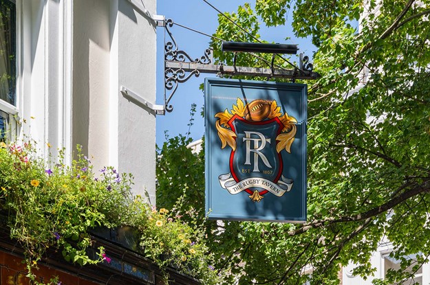The rugby Tavern pub front with signage