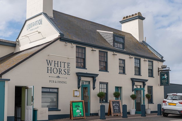 White horse jersey exterior of building