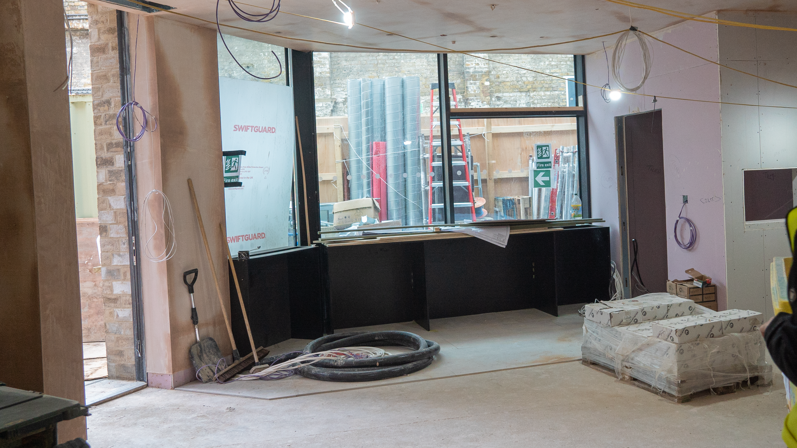 Bar in restaurant with bar stools 