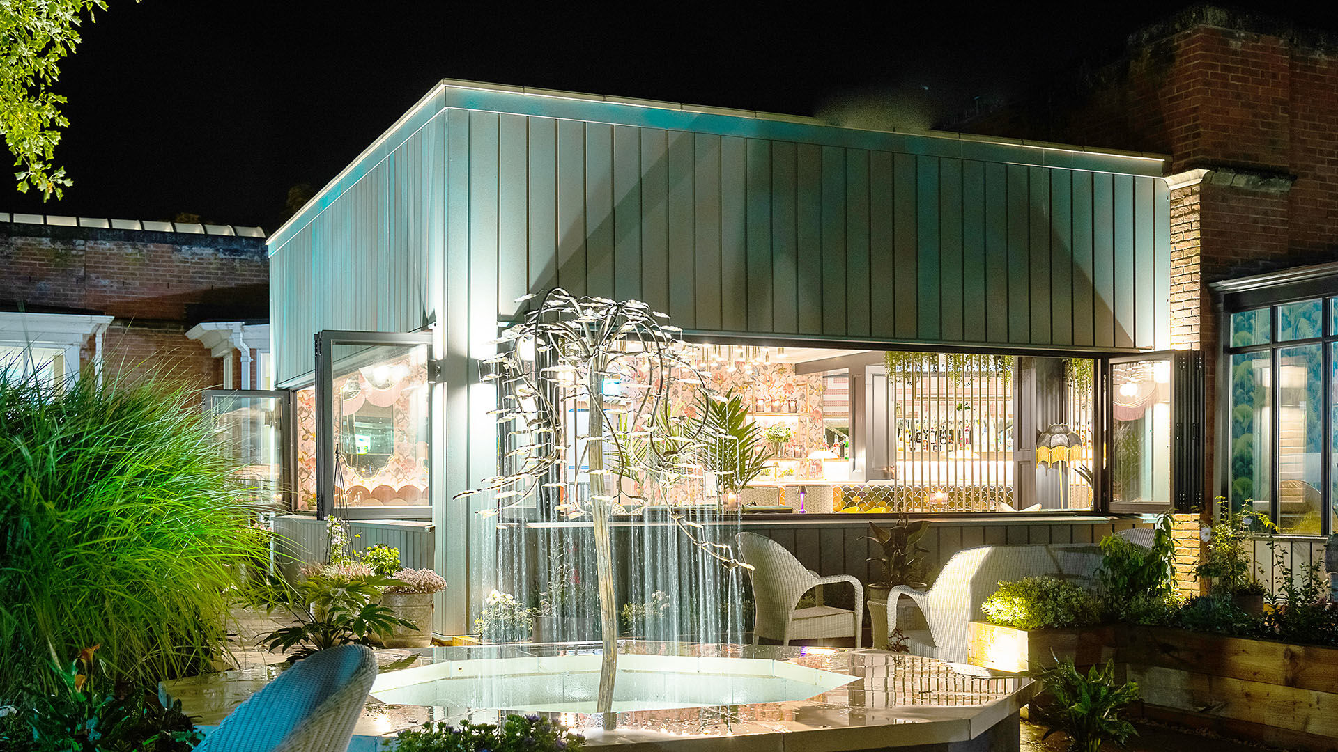 Interior dining area after the fit-out with red lampshade and seating