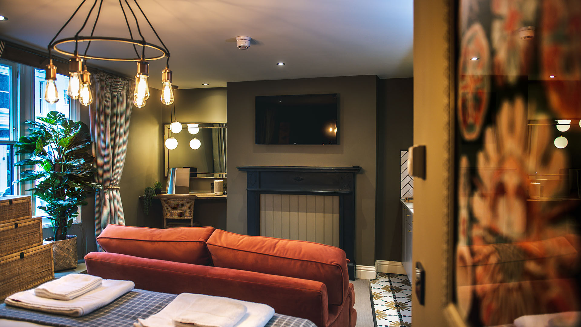 Room with a fireplace and windows