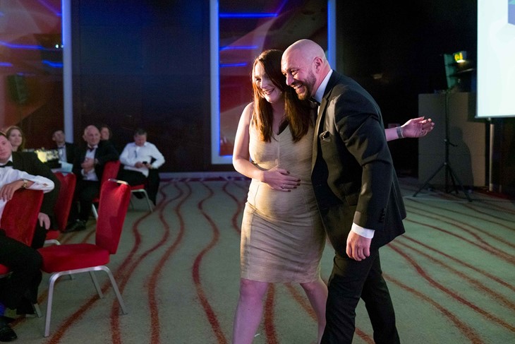 Team celebrating the award