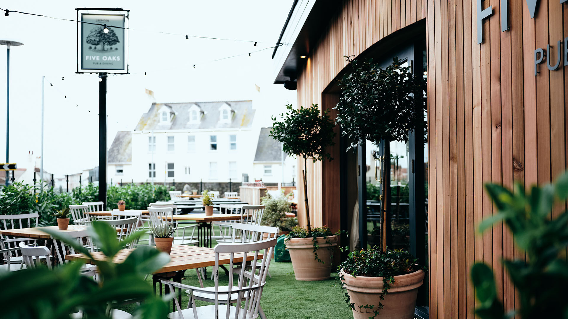 Interior dining area after the fit-out with red lampshade and seating