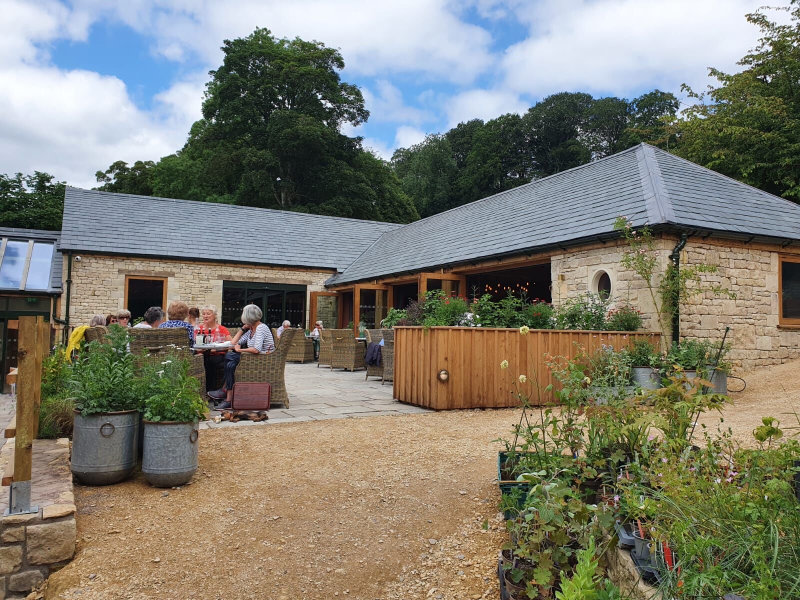 Before and after the interior design fit-out for the cafe at Iford Manor
