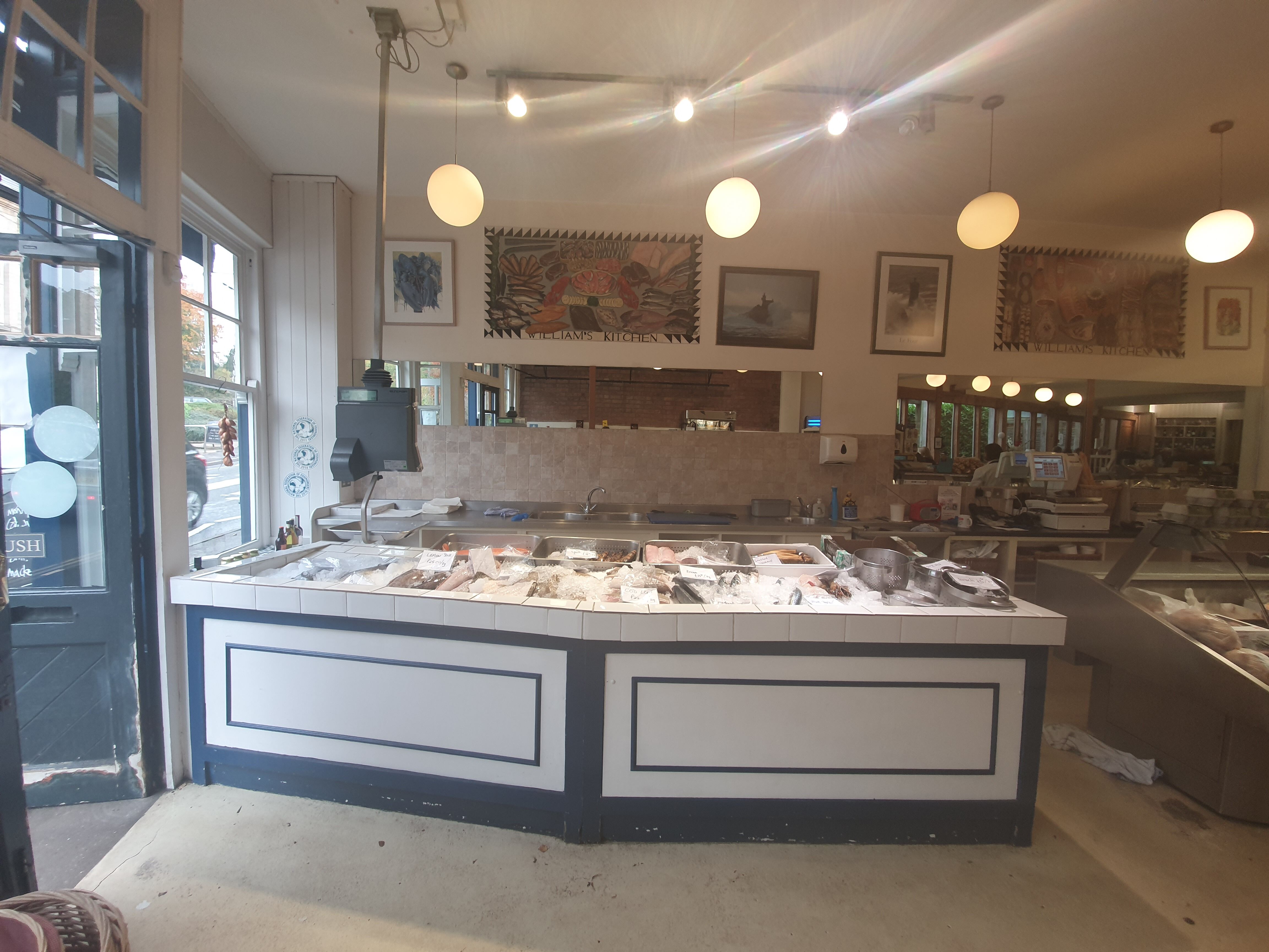 The refurbished William's food hall featuring the fishmonger counter before and after the fit-out