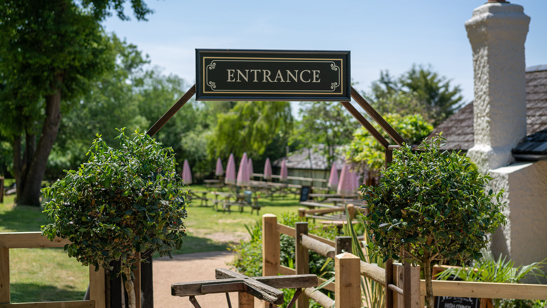 Entrance sign to pub garden