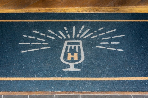The Hercules London branded floor mat with logo on designed by Concorde bgw group