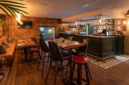 Modern pub with tall bar stools