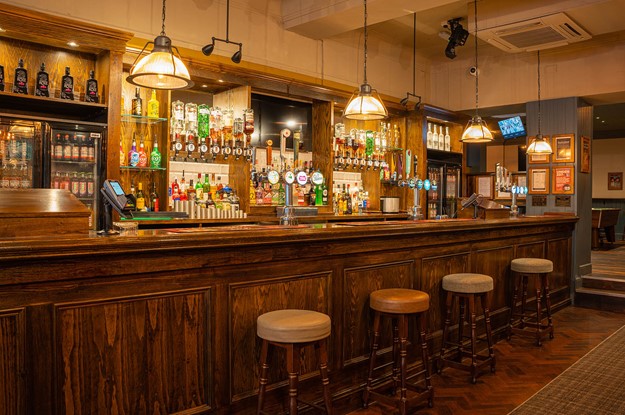 The Lowther bar with bar stools