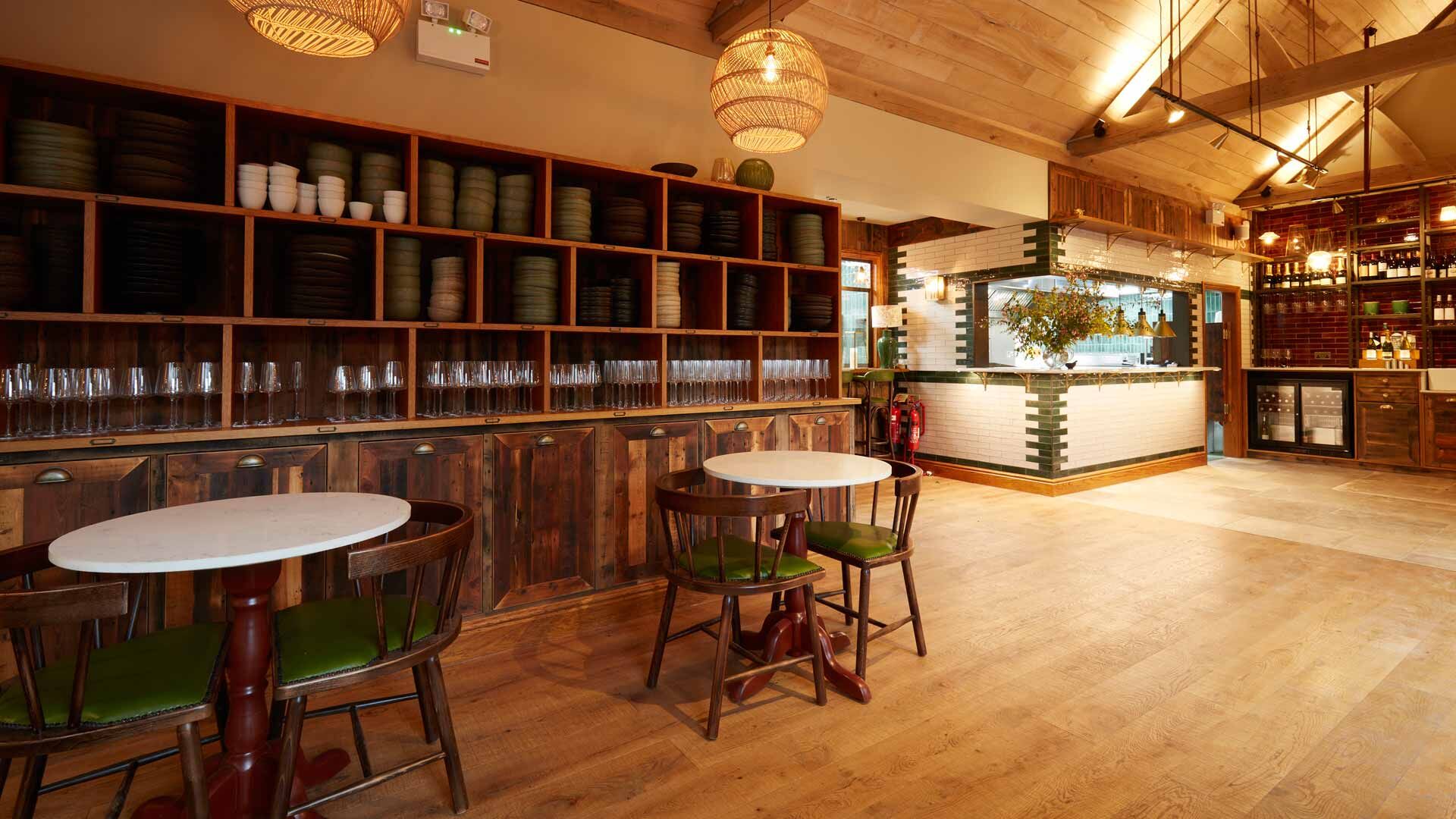 Bedroom with green wall and artwork